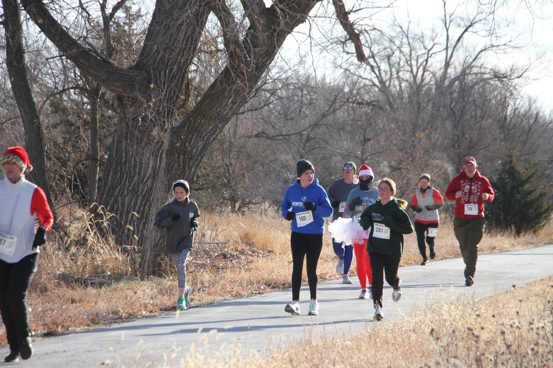 Jingle Bell runners rock down the trail